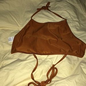 I’m selling a SHEIN Halter neck lace top in the color brown , open back